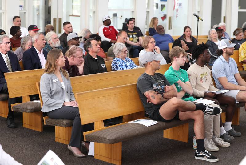 Attendees listen to speakers during the informational meeting Thursday, May 18, 2023, at New Hope Missionary Baptist Church in DeKalb. The meeting centered on the the proposed plans for the vacant lot on the corner of Blackhawk Road and Hillcrest Drive.