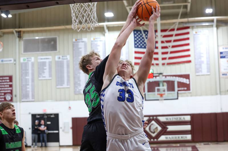 Bishop McNamara's Richie Darr, left, and Clifton Central's Jake Thompson reach for a rebound during the Fightin' Irish's 62-41 victory in the Watseka Holiday Tournament championship on Tuesday, Dec. 16, 2025.