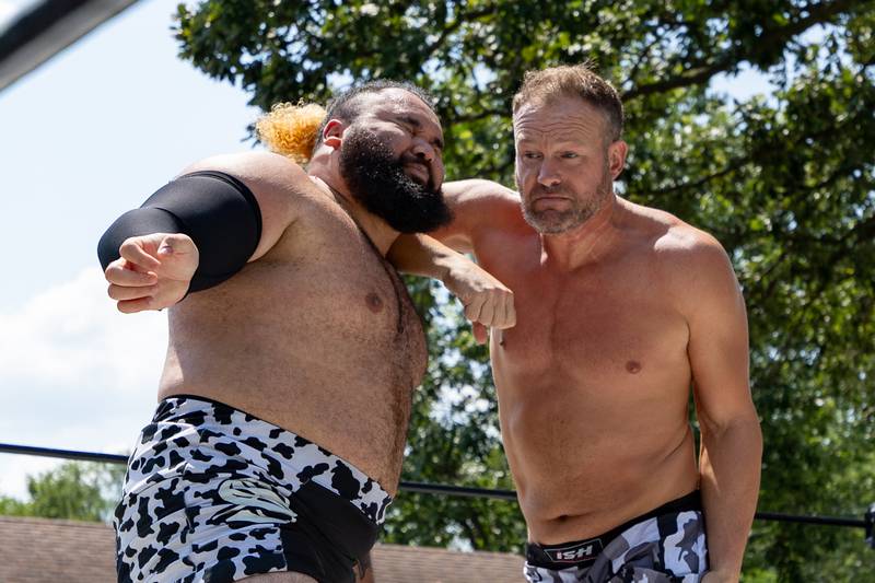 (left to right) Solomon Tupa gets forearmed by Christian Rose at the Taste of the Illinois Valley DreamWave Wrestling event on Saturday, August 2, 2025 at Centennial Park in Peru.
