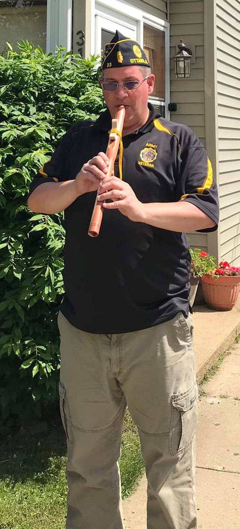 Ottawa American Legion Senior Vice Commander Matthew Weaver plays "Taps" for "Taps Across American" last year. Weaver will lead the Veterans Honor Guard Vigil at Ottawa's Washington Square.
