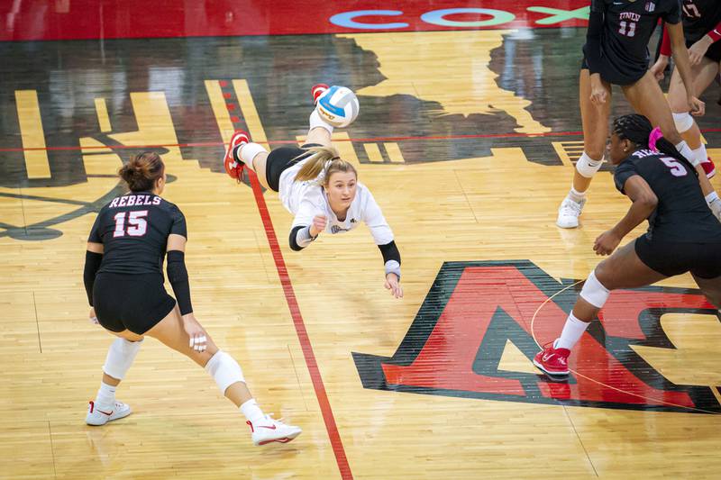 Rock Falls native Maya Sands dives for a dig during UNLV's volleyball match against Wyoming at Cox Pavilion in Las Vegas on Nov. 17, 2022. The Rebels won 3-1 and were crowned the Mountain West regular-season champions. Sands started all season at libero for UNLV, and is transferring to Missouri for next season.