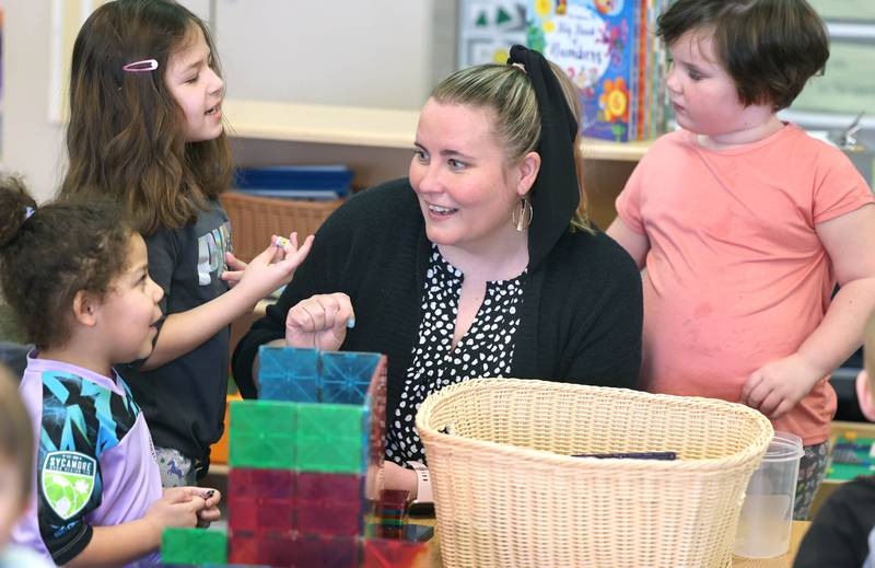 Laurel Copeland, Little Spartans Early Learning Program teacher at South Prairie Elementary School, works with students Wednesday, April 6, 2023, at the school in Sycamore.