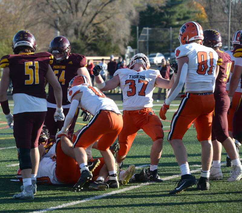 Byron's Caden Considine (37) reacts after the Tigers stopped a run by Lombard-Montini in the fourth quarter during 3A semifinal action in Lombard on Saturday, Nov. 18, 2023.