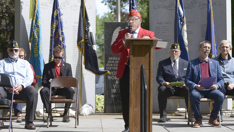 Veteran and Master of Ceremony Joe Navarro , speaks to the crowd gathered at Washington Park in Ottawa for the annual Memorial Day ceremony Monday.