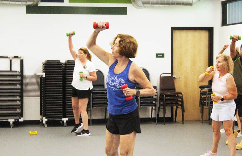 Mari Jo Hecker leads a Cardio Fit class on July 23, 2025  at Davis Community Center in Mount Carroll.