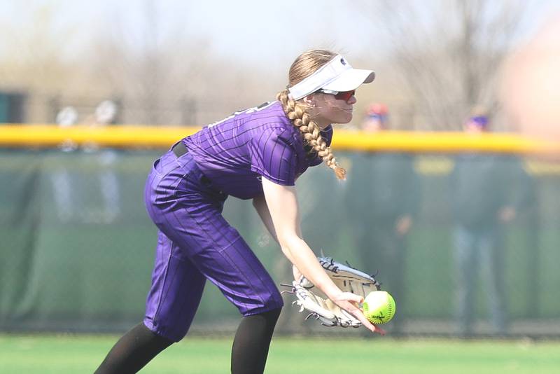 Wilmington’s Keeley Walsh flips the ball to first base for the out against Coal City on Monday, March 30, 2026 in Coal City.