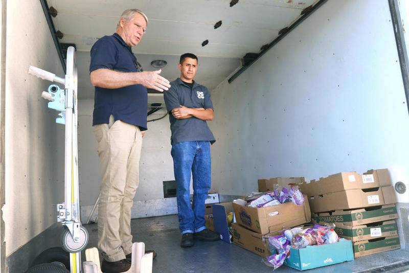 Since Gov. JB Pritzker's stay-at-home order went into effect March 21, DCCG's mobile food pantry, the Grow Mobile, has held eight mobile pantries in 17 days, including at Sandwich, Malta, DeKalb and Sycamore, said Dan Kenney, (left) director of DeKalb County Community Gardens.