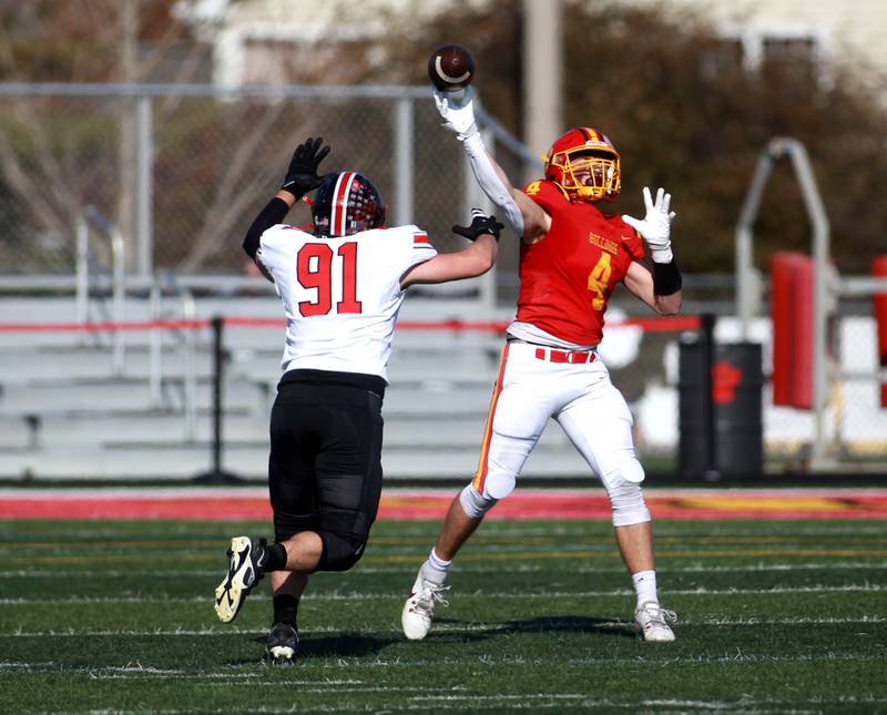 Batavia’s Charlie Whelpley throws the ball after getting a lateral pass from quarterback Ryan Boe during the Class 7A second round playoff game against Lincoln-Way Central in Batavia on Saturday, Nov. 4, 2023.