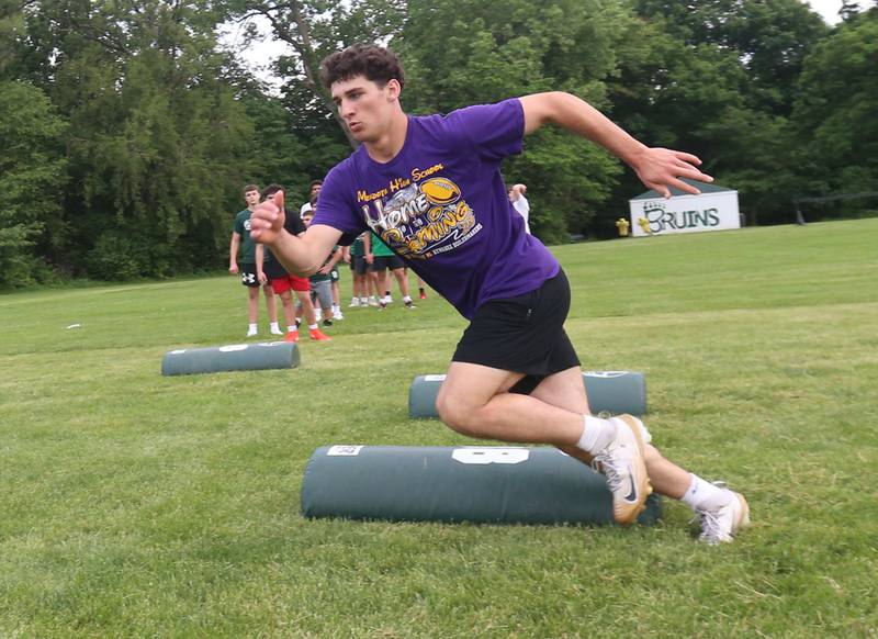 Quinn Eddy of Mendota, runs bag drills during the Tyson Bagent Offensive Skills Camp on Saturday, May 23, 2026 at St Bede Academy.