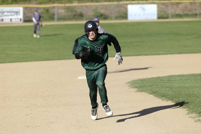 Rock Falls’ Ethan Moeller heads to third against Dixon Tuesday, April 29, 2025.