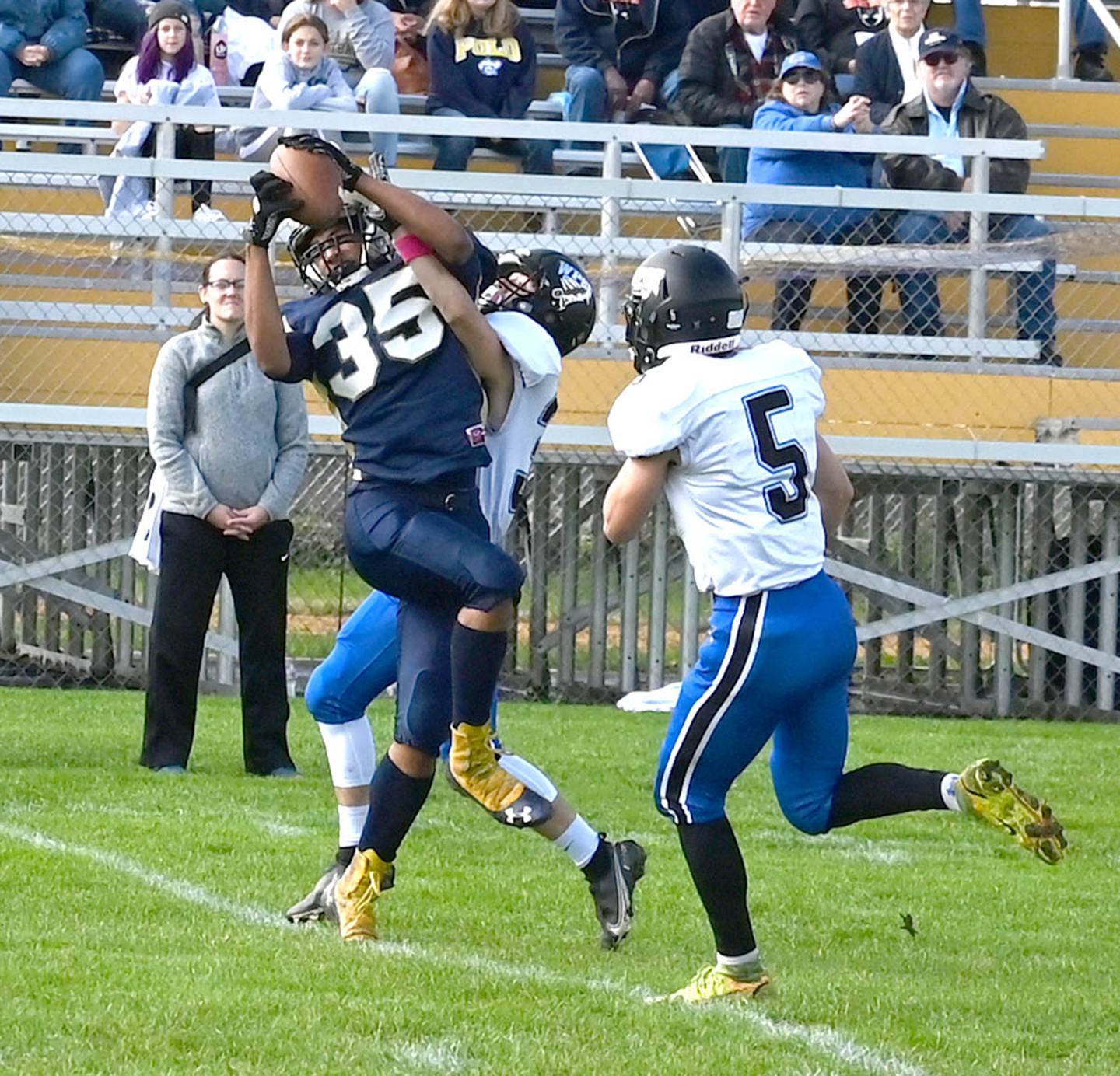 Polo's Kahil Sankey secures a pass on the far sideline during the first quarter against West Prairie Saturday.