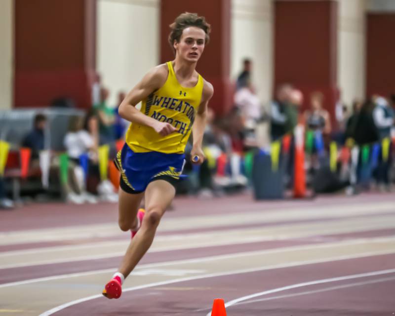 Wheaton North's Ethan Le runs the first leg in the 4x200 during DuKane Boys Indoor Track and Field Conference Championships. Mar 16, 2024