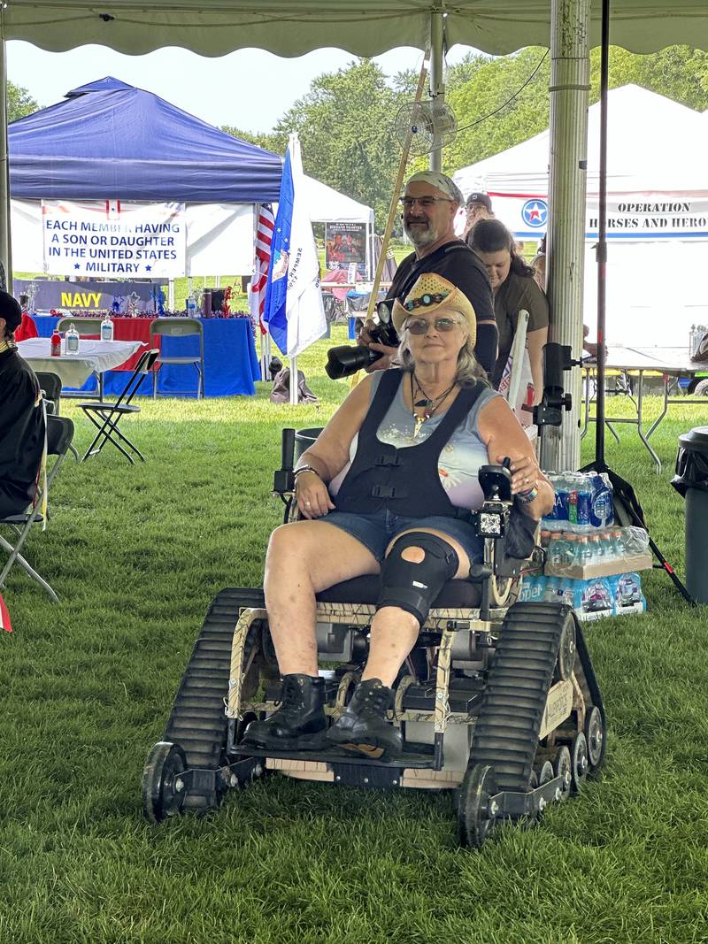 Phyllis Clower uses a VetTank at the POW WOW AllenForce event at Cantigny Park in 2024.