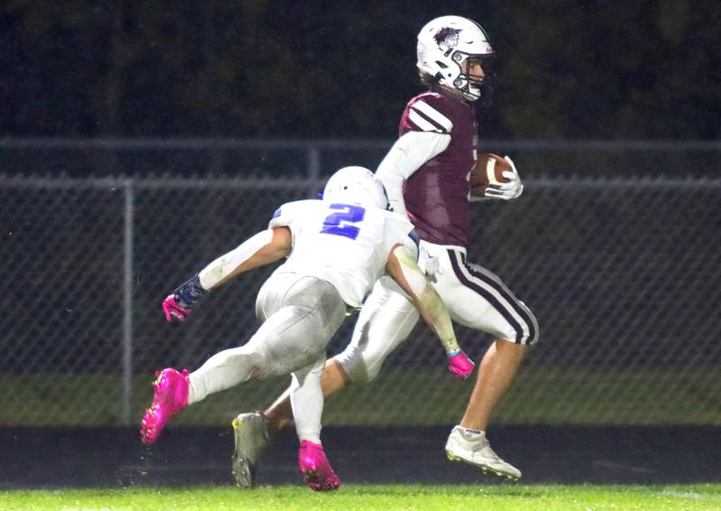 Prairie Ridge’s  Logan Thennes sprints after making an interception against Vernon Hills in IHSA football Class 5A first-round playoff action at Prairie Ridge High School in Crystal Lake on Friday, October 31, 2025.