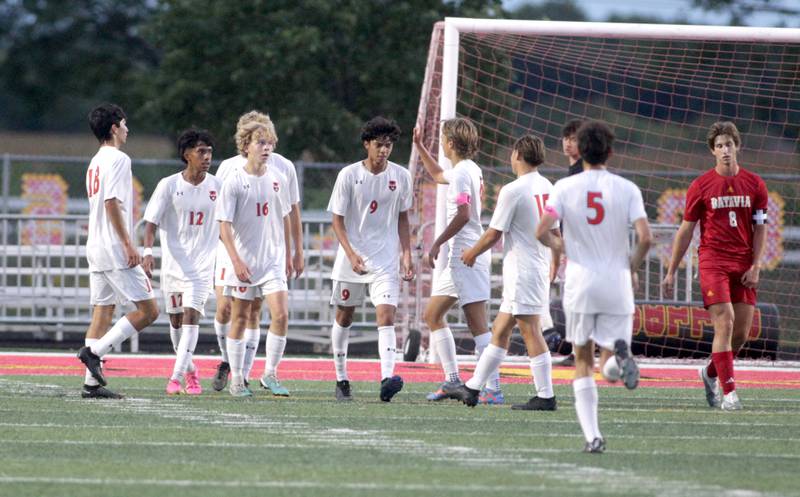 Oswego players celebrate Michael Moreno’s goal during the first half of a game at Batavia on Thursday, Sept. 7, 2023.