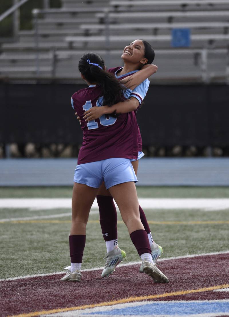 Kankakee's Jocelyn Sanchez, right, and Alexsandra Quintanar, left, celebrate a goal by Quintanar against Crete-Monee on May 12, 2025.