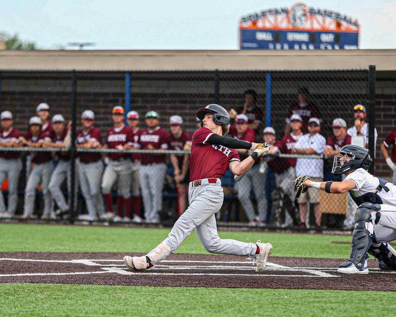 Plainfield North's John St. Clair (2) follows through on a swing during Class 4A Romeoville Sectional semifinal game between Plainfield North at Oswego.  June 1, 2023.