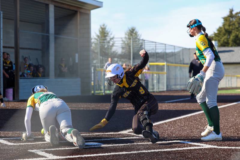 Herscher's Keira Ahramovich evades Coal City catcher Khloe Picard recovers the ball during Coal City's 14-10 victory over Herscher on Monday, April 20, 2026.