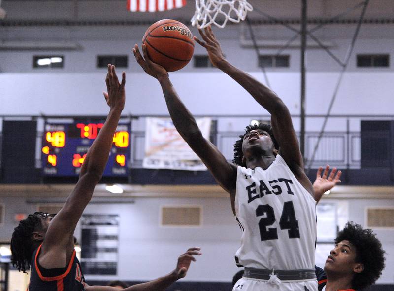 Boys Basketball: Mekhi Lowery Oswego East pull out close one over