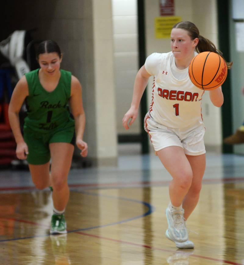 Oregon's Madison Shaffer (1) pushes the ball up court against Rock Falls during 2A regional action on Saturday, Feb. 15, 2025 at Oregon High School.