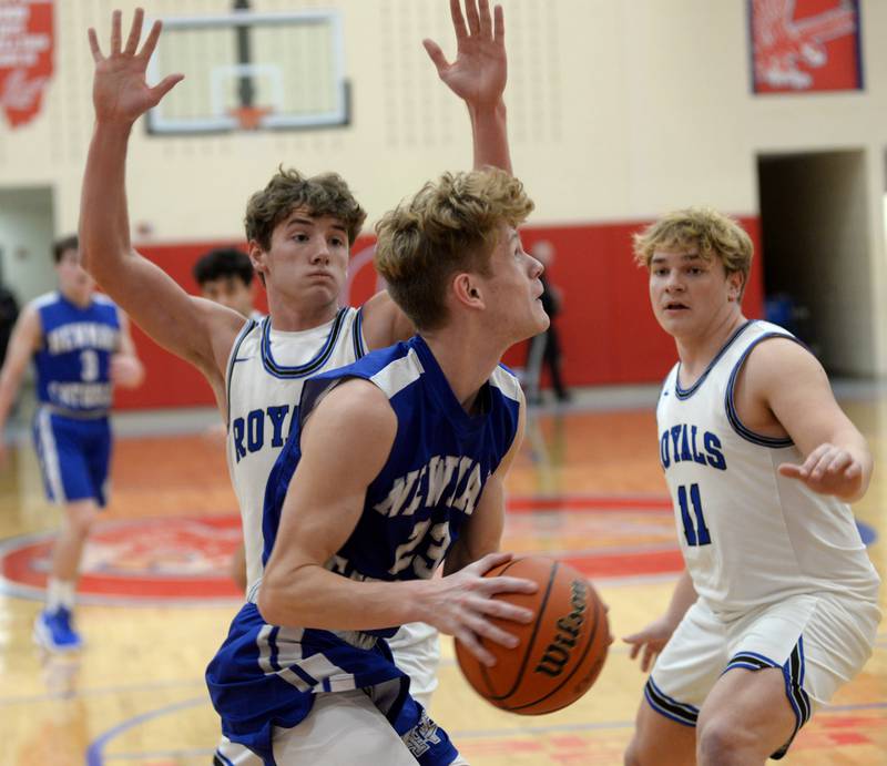 Sterling Newman's Lucas Simpson (23) drives the baseline against Hinckley Big-Rock during Friday, Nov. 24, 2023 action at the Oregon Thanksgiving Tournament held at the Blackhawk Center at Oregon High School.