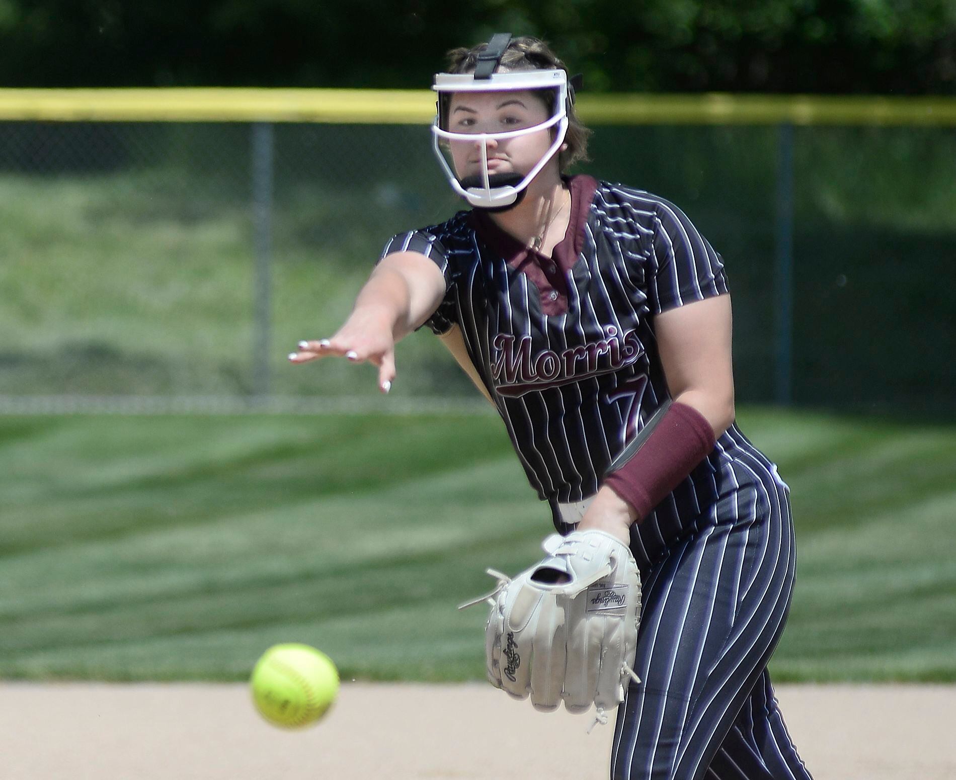 Morris pitcher Ella Davis delivers home during the Class 3A Ottawa Regional championship game Saturday, May 27, 2023.