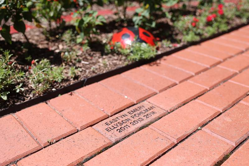 Names of donors are placed along the cobble stone path at the Children’s Garden in Elwood. The Children’s Garden in Elwood recently celebrated their 25th anniversary. Saturday, July 9, 2022 in Elwood.