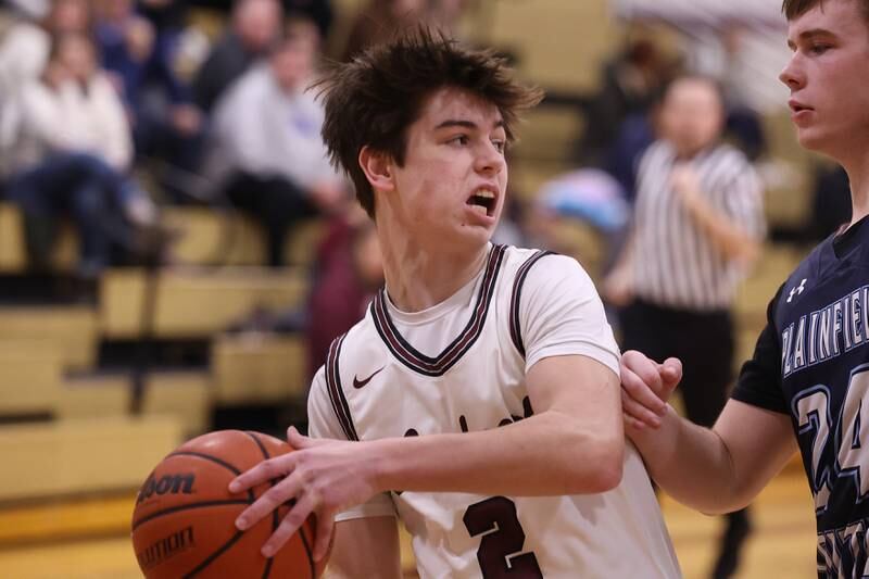 Lockport’s Drew Gallagher looks to pass out of pressure against Plainfield South on Wednesday January 25th, 2023.