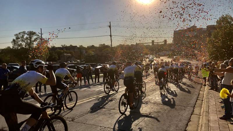 Cyclists finish a 475-mile charity bike ride for pediatric cancer at the corner of Illinois Street and Riverside Avenue in St. Charles on Oct. 10, 2024.