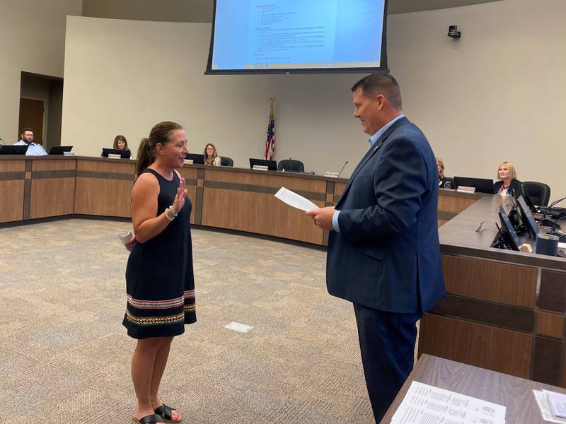 Carrie Hall takes her oath during Monday night's Morris City Council meeting.