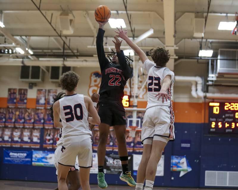 Yorkville's Braydon Porter (22) puts up a shot during their basketball game between Yorkville at Oswego, Feb 7, 2026 in Oswego.