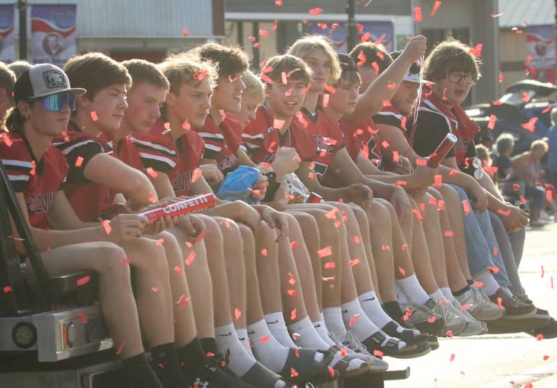 The Hal High School football team rides during the Homecoming parade on Thursday, Sept. 18, 2025 downtown Spring Valley.
