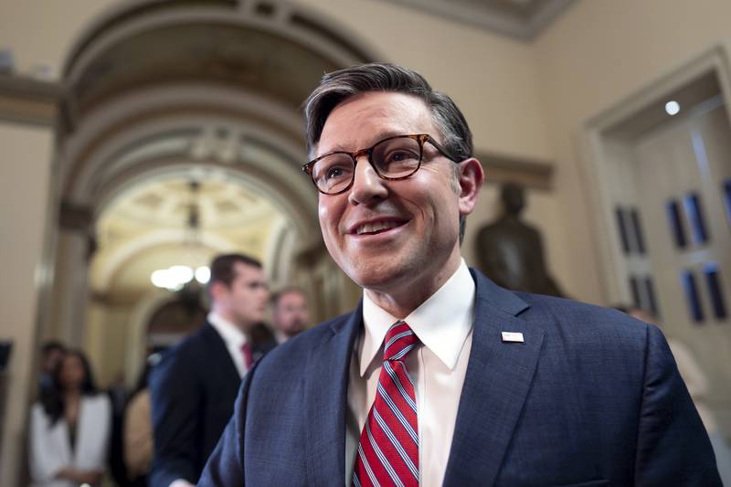 Speaker of the House Mike Johnson, R-La., talks to reporters just after lawmakers pushed a $95 billion national security aid package for Ukraine, Israel and other U.S. allies closer to passage, at the Capitol in Washington, Friday, April 19, 2024. (AP Photo/J. Scott Applewhite)