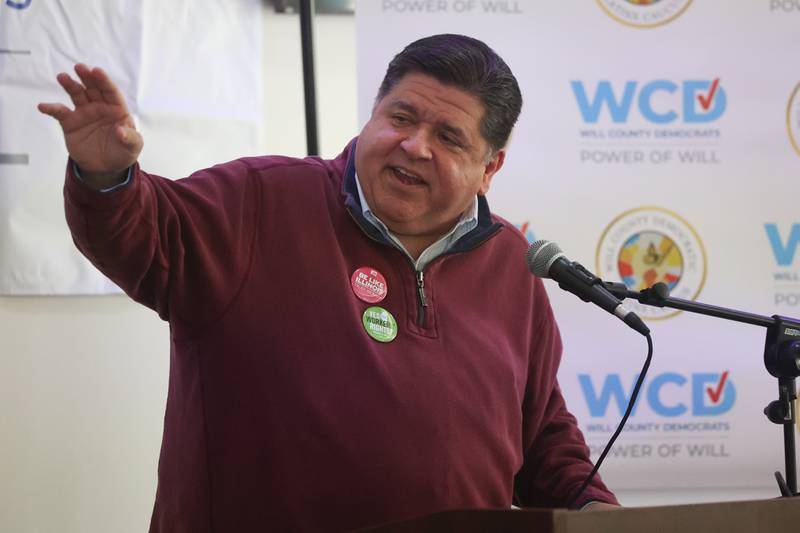 Governor JB Pritzker speaks at the Will County Latinx Day of Action, an effort to talk with and engage with Latinx voters, at El Camaleon Bar and Grlll in Joliet. Saturday, Oct. 1, 2022, in Joliet.