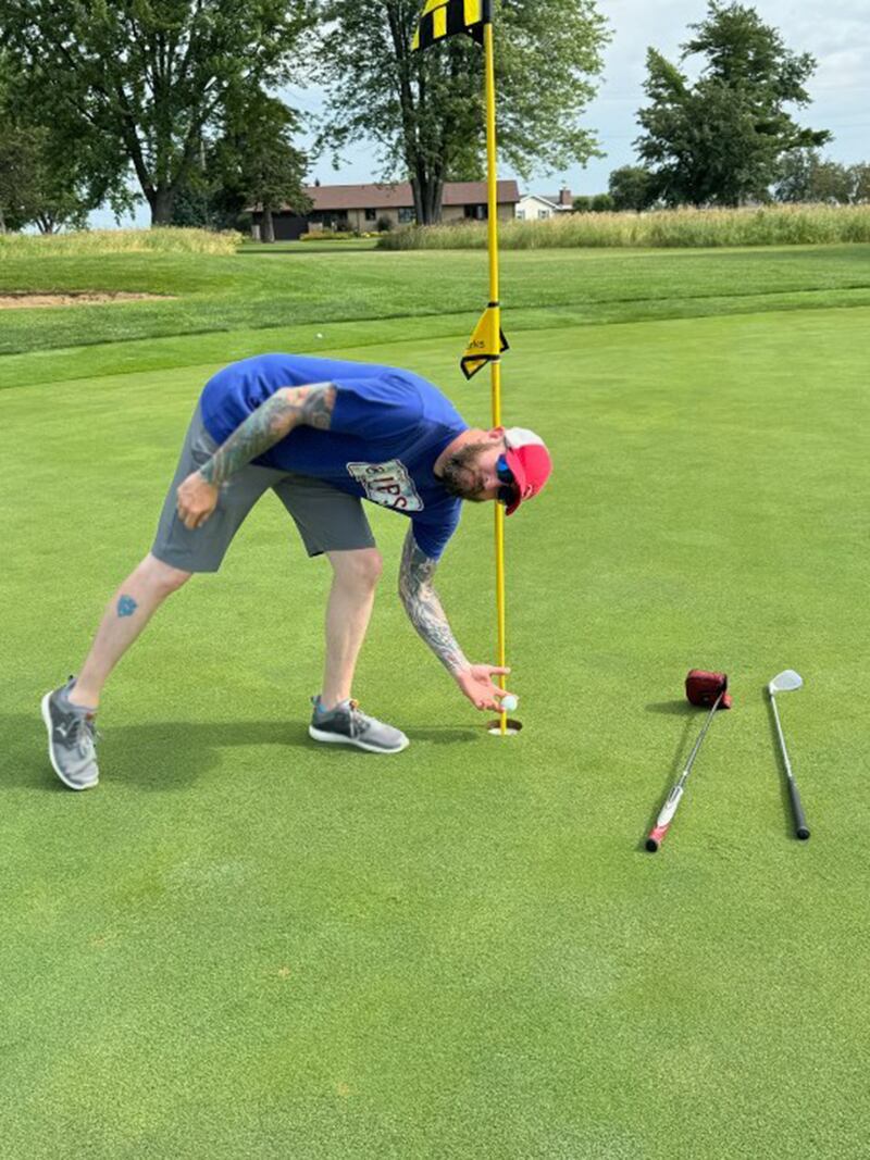 Matt Morris is pictured after acing hole No. 4 at Emerald Hill Golf Course on June 22.