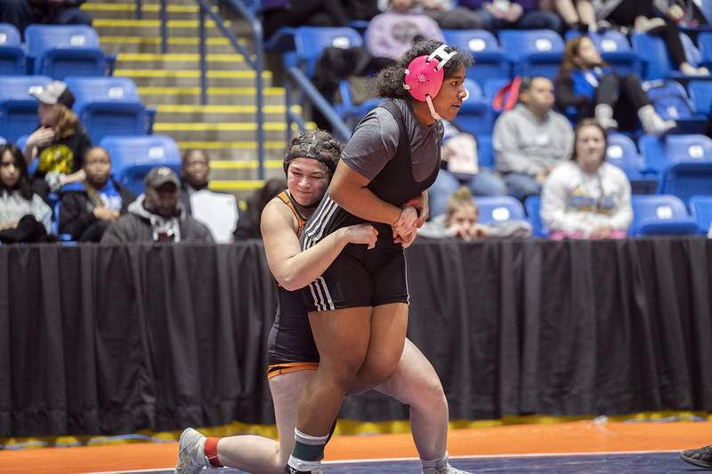 Jaiden Moody of Minooka holds on to Jasmine Rene of Wheeling in the 190 pound third place match at the IHSA girls state wrestling championship Saturday, Feb. 25, 2023.