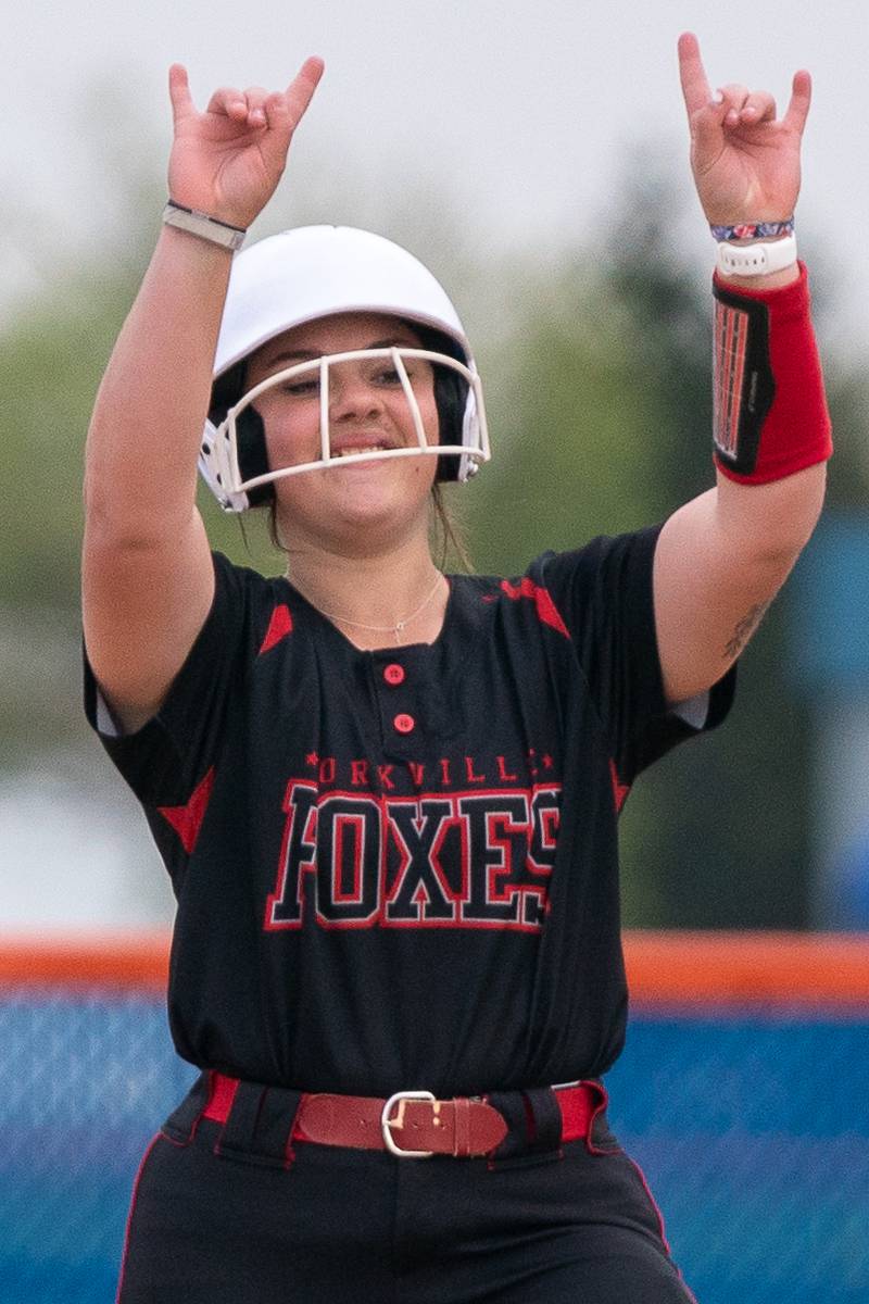 Yorkville's Sara Ebner (14) reacts after driving in a run against Oswego during a softball game at Oswego High School on Tuesday, April 25, 2023.