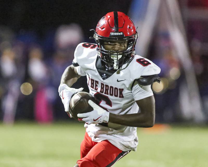 Bolingbrook's Caleb Wallace (6) runs after catching a pass during football game between Bolingbrook at Oswego Friday, Sept 12, 2025  in Oswego.