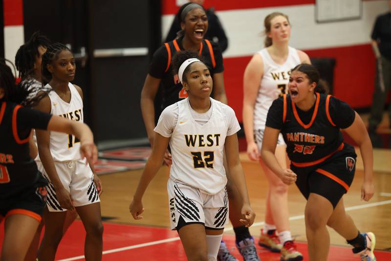Joliet West’s Makayla Chism (22) leaves the court in a 50-49 loss to East Moline United in the Class 4A Bradley-Bourbonnais Regional championship on Friday, February 17th, 2023 in Bradley.