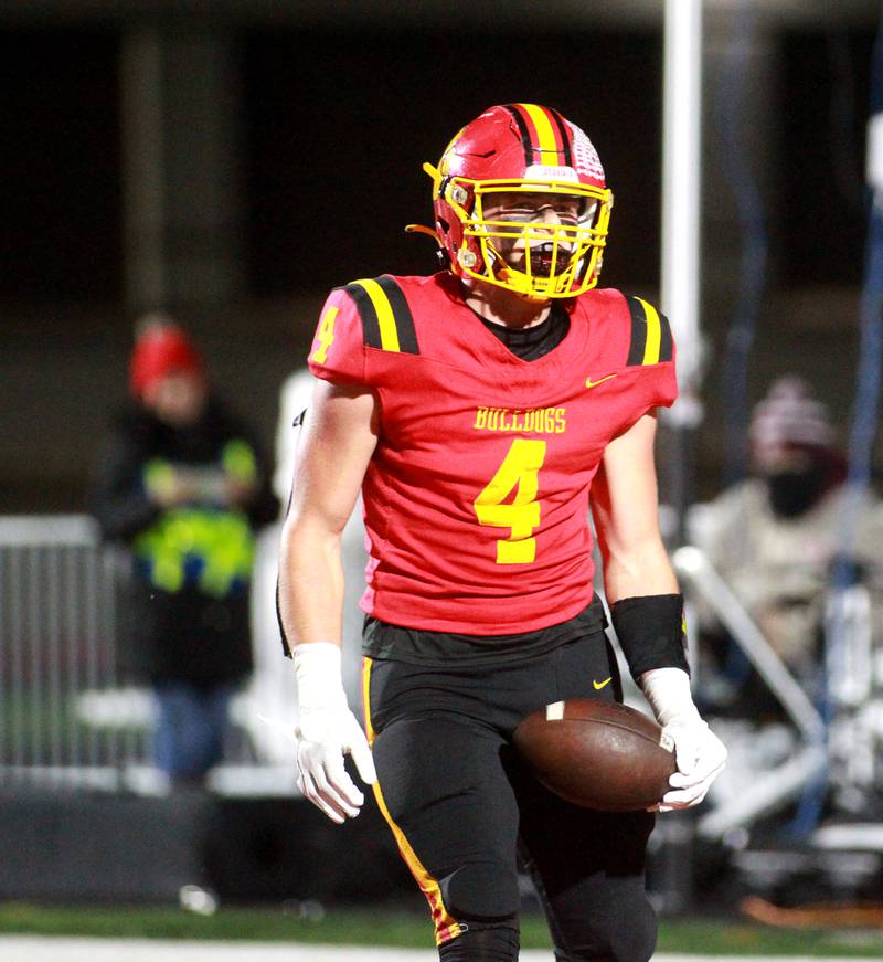 Batavia’s Charlie Whelpley celebrates in the end zone following his touchdown during a Class 7A round 1 playoff game against Brother Rice in Batavia on Friday, Oct. 27, 2023.