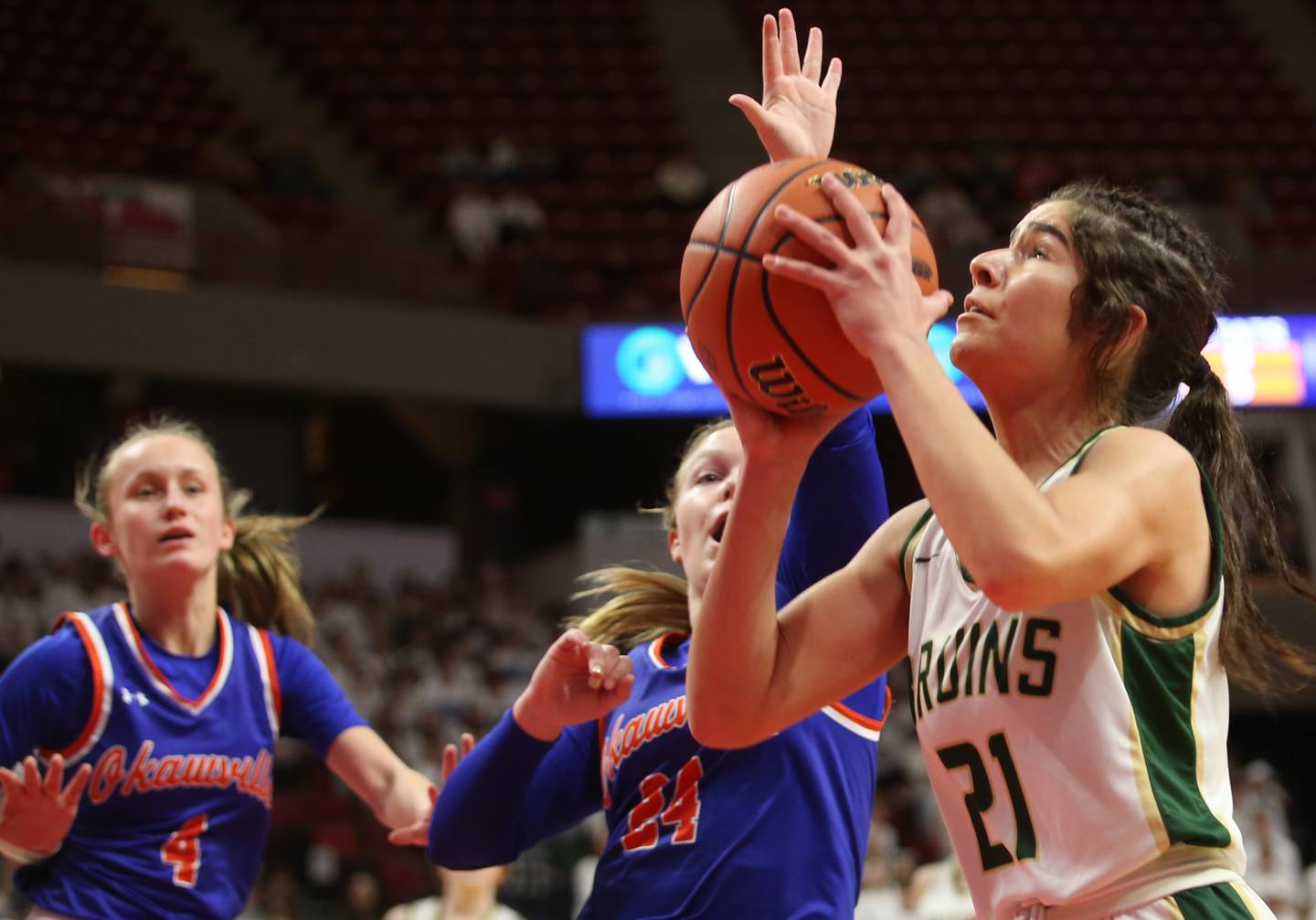 St. Bede's Lili Bosnich eyes the hoop as Okawville's Madisyn Wienstroer defends during the Class 1A State semifinal game on Thursday, Feb. 29, 2024 at CEFCU Arena in Normal.