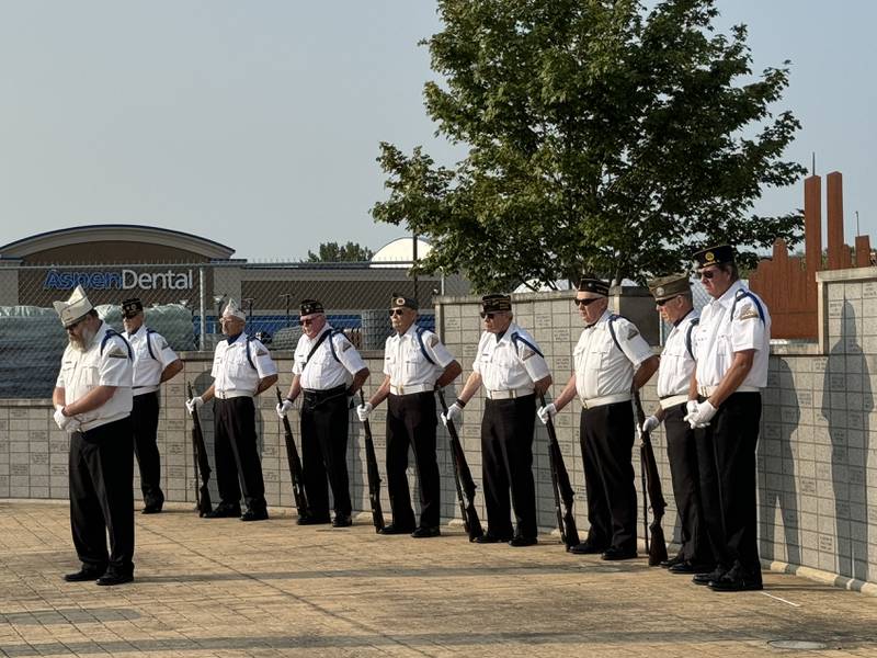 Rob Dettman (front, left) is both the Chef de Guerre of the 40&8 and the Commander of the Morris Honor Guard. Many members of the Morris Honor Guard are also members of the 40&8. Behind Dettman in a similar gray cap is Jerry Terando.