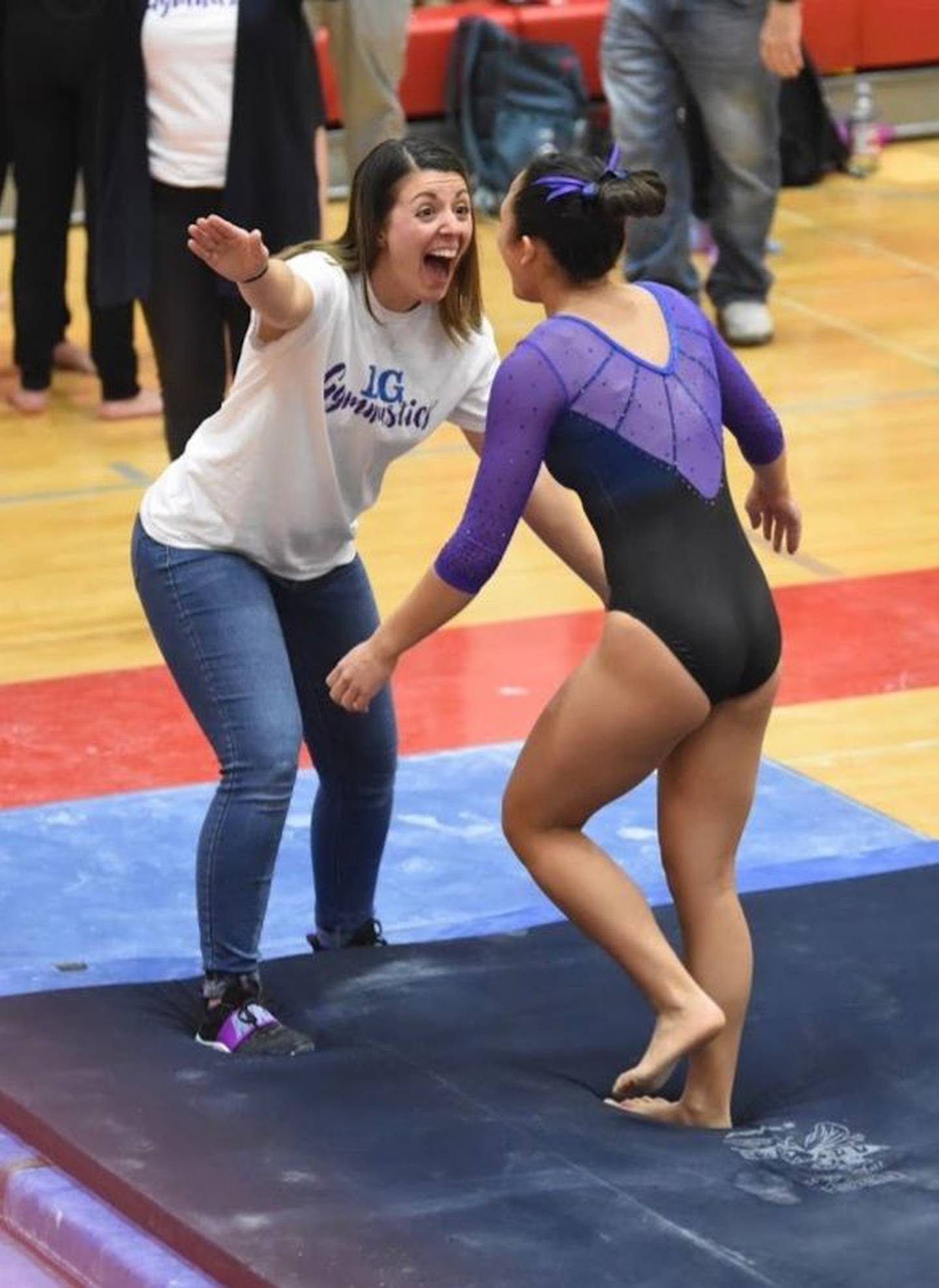 Downers Grove co-op head coach Kristyn Campos (left).