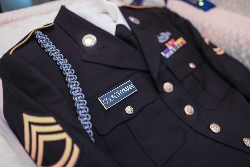 The uniform of Arthur Countryman sits in his empty casket on Friday, Aug. 6, 2021, at Overman Jones Funeral Home in Plainfield, Ill.