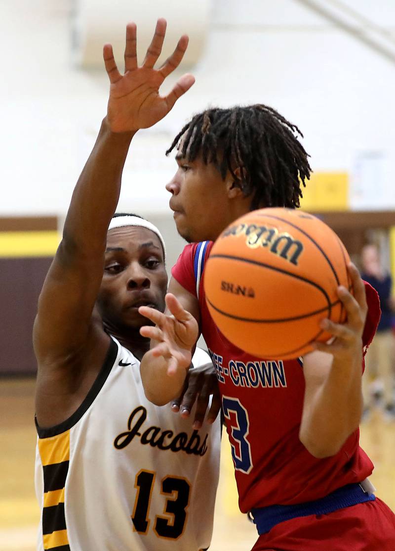 Jacobs' Elijah Bell pressures Dundee-Crown's Rasheed Trice as he drives the baseline during a Fox Valley Conference boys basketball game on Tuesday, February. 3, 2026, at Jacobs High School in Algonquin.