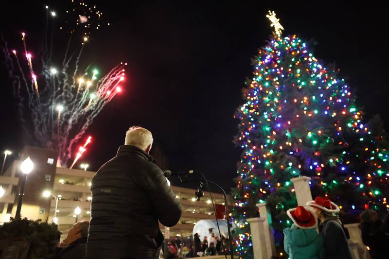 Fireworks light up the sky and the Christmas is lite at the Joliet Light up the Holidays Parade in downtown Joliet on Friday, Nov. 24, 2023.