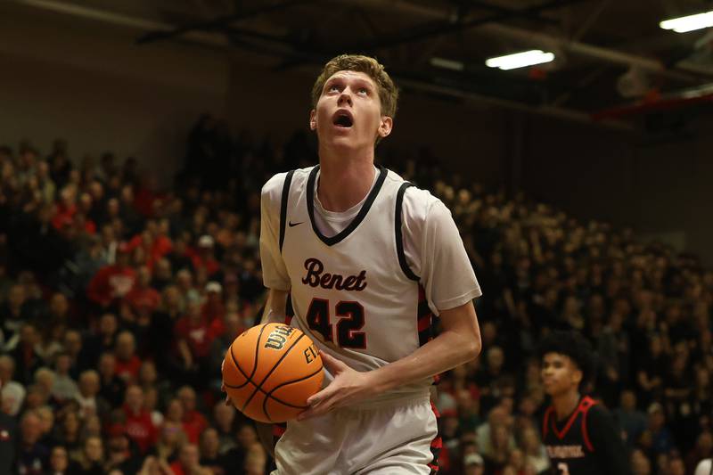 Benet’s Colin Stack works under the basket against Bolingbrook in the Class 4A Bolingbrook Sectional championship game on Friday, March 6, 2026 in Bolingbrook.