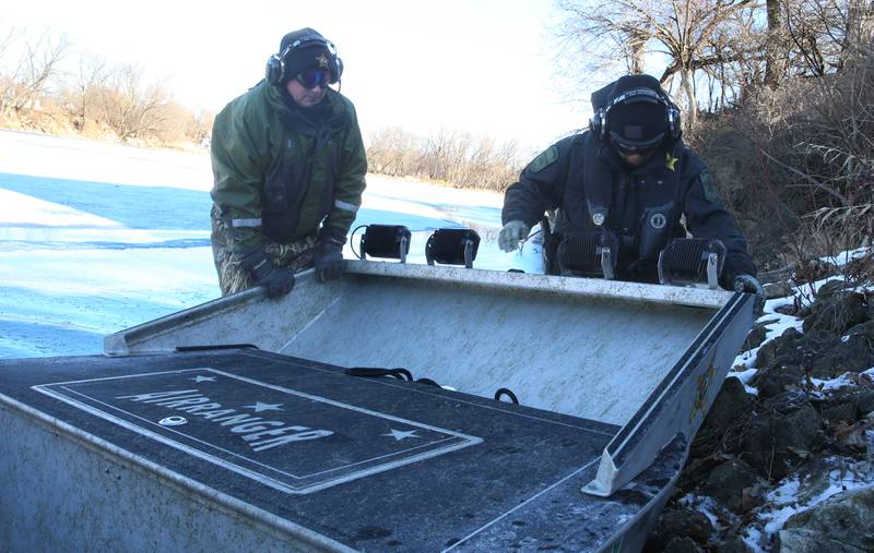 Conservation Police officers Dave Wollgast and Sarah Caballero conduct a training mission on Monday, Jan. 27, 2025 along the Fox River in Ottawa.