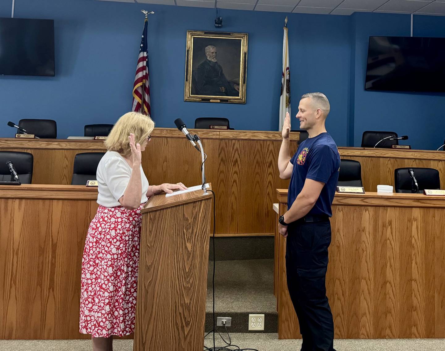 La Salle City Clerk Liz Bishop swears in firefighter paramedic Jacob Szafranski on July 30, 2025, at City Hall.
