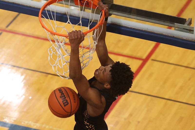Joliet West’s Jeremy Fears dunks against Joliet Central.